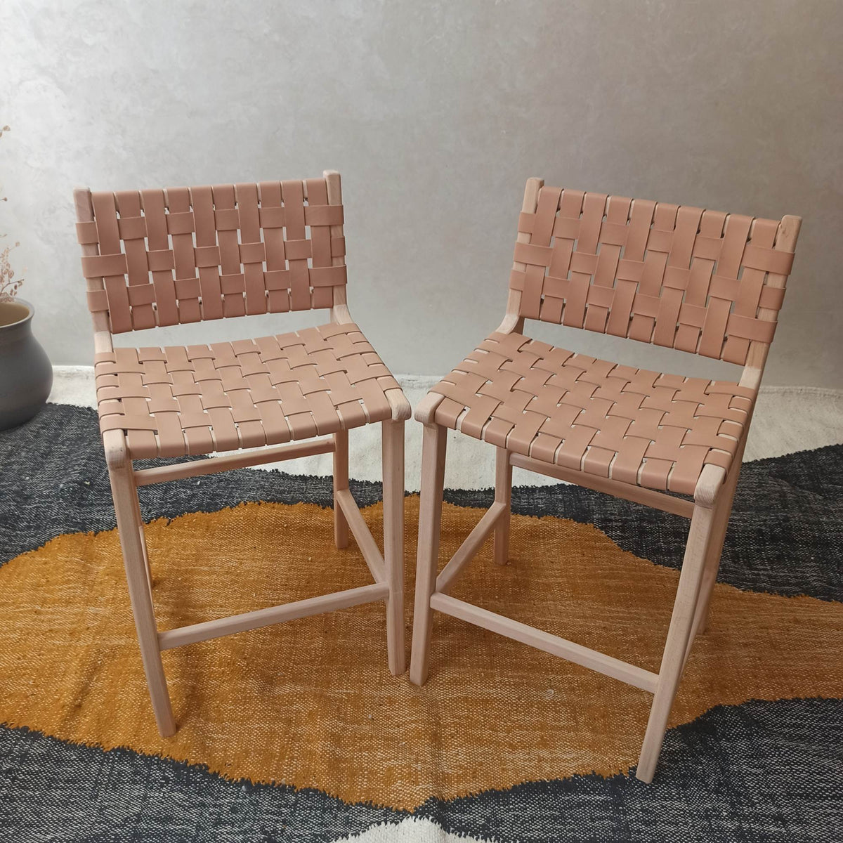 Sleek modern wood stool by Artihandmade®, designed for contemporary spaces.