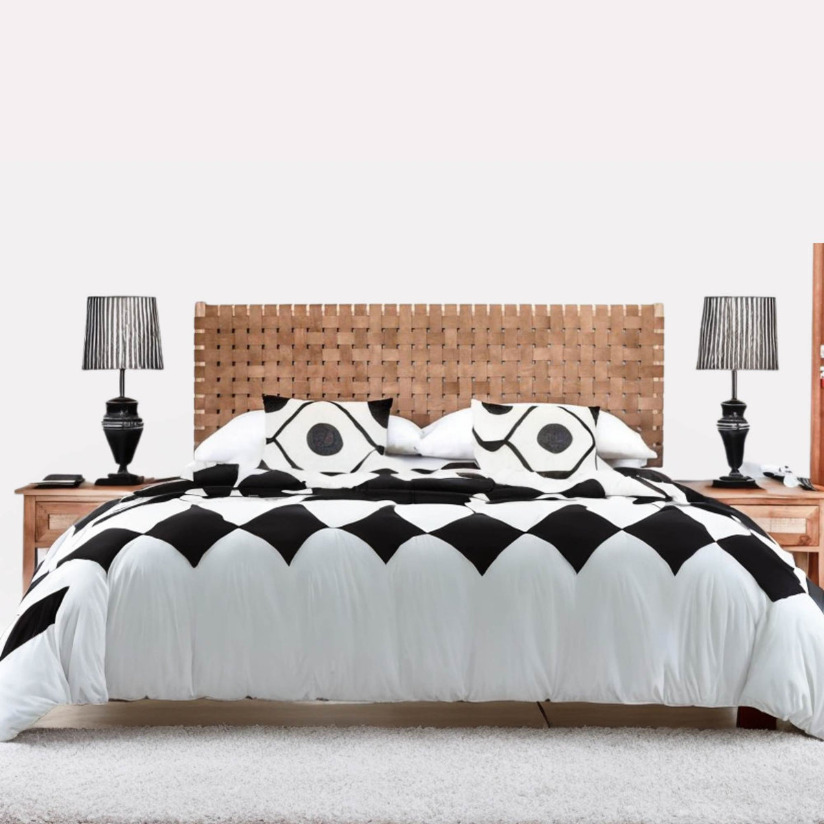 Queen leather headboard, enhancing bedroom aesthetics.