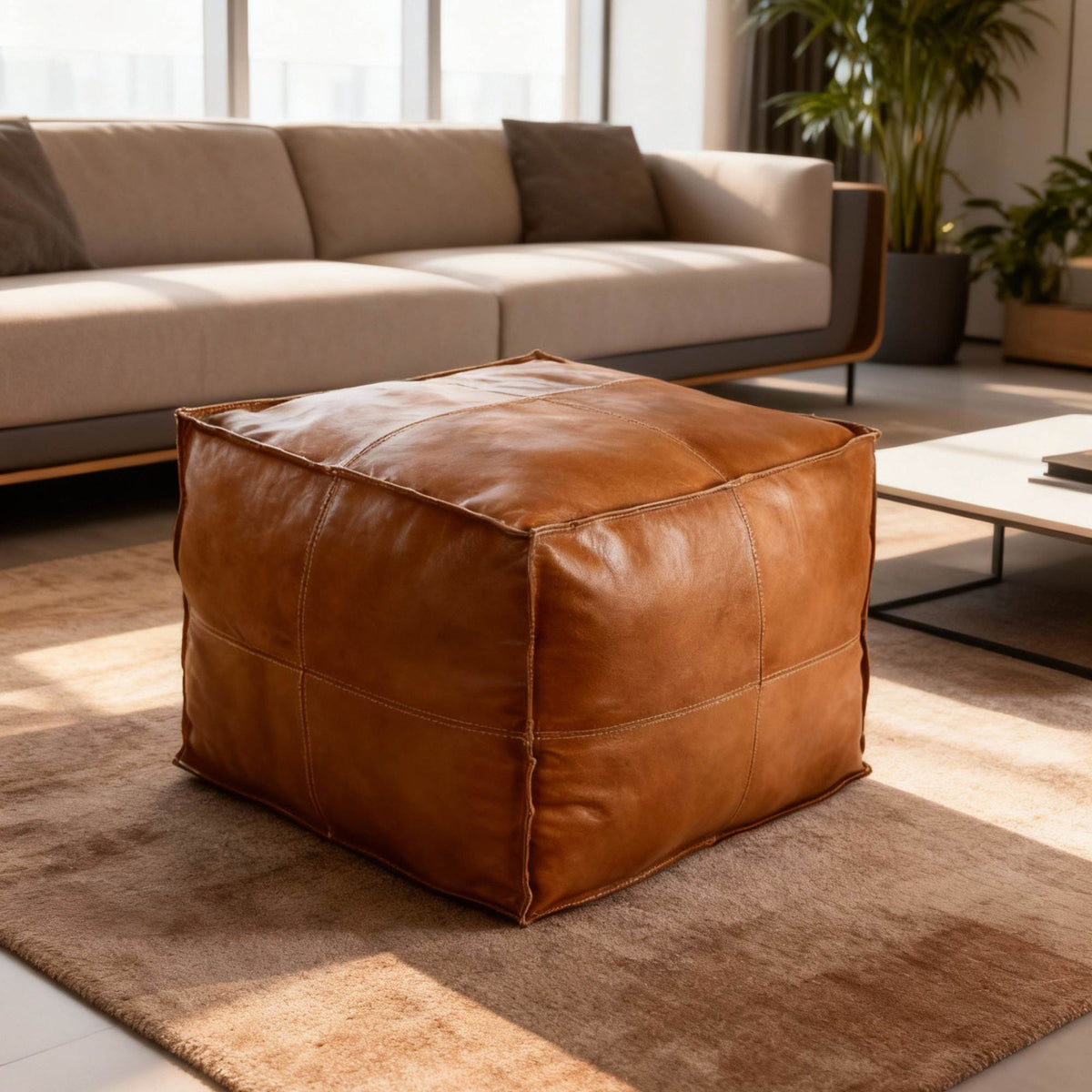 Handcrafted square leather ottoman poufs for stylish comfort. Perfect as footrests, extra seating, or décor accents for any living space.