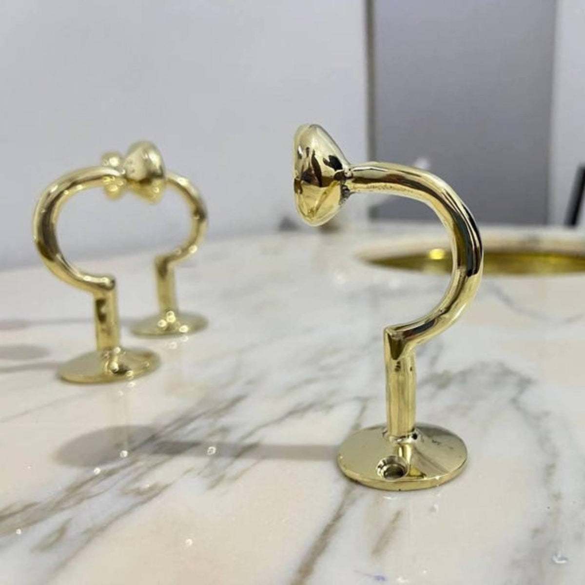 Gold decorative elements on a marble surface