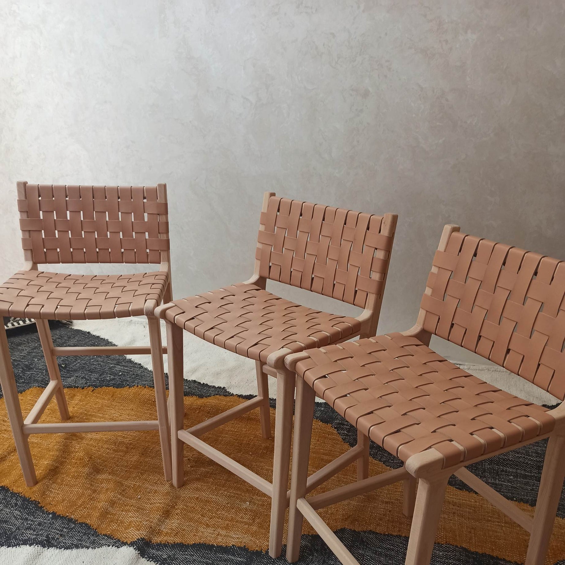 Durable Artihandmade® bar stool for restaurant use, featuring quality wood construction.