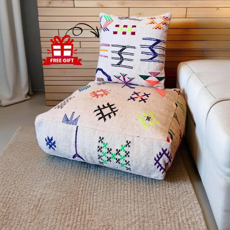 Set of two large, square Kilim poufs.